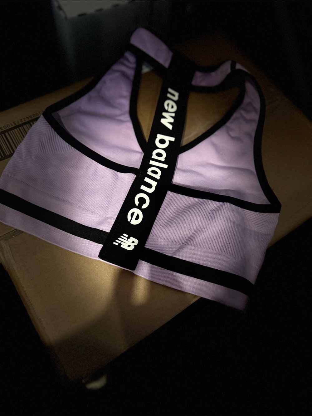 New Balance Lavender Sports Bra with Black Trim and Logo Strap